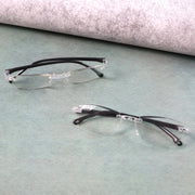 Protective case storing lightweight rimless reading glasses for travel