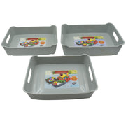 Compact plastic trays used for organizing cosmetics and stationery on a desk