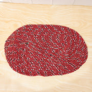 Detail shot of textured red floor mat for indoor use