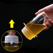 Small silicone lids sealing a jar and a mug.