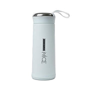 Durable glass water bottle with a protective grey silicone sleeve and bamboo lid for a firm grip.