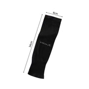 Black elbow compression sleeve on arm showing flexible fabric