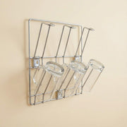 Wall-mounted stainless steel cup rack holding multiple drinkware