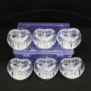 Battery powered LED crystal tealight candles set illuminating room