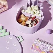 Side profile of the pineapple kids bento lunch box, highlighting its depth and compact design.