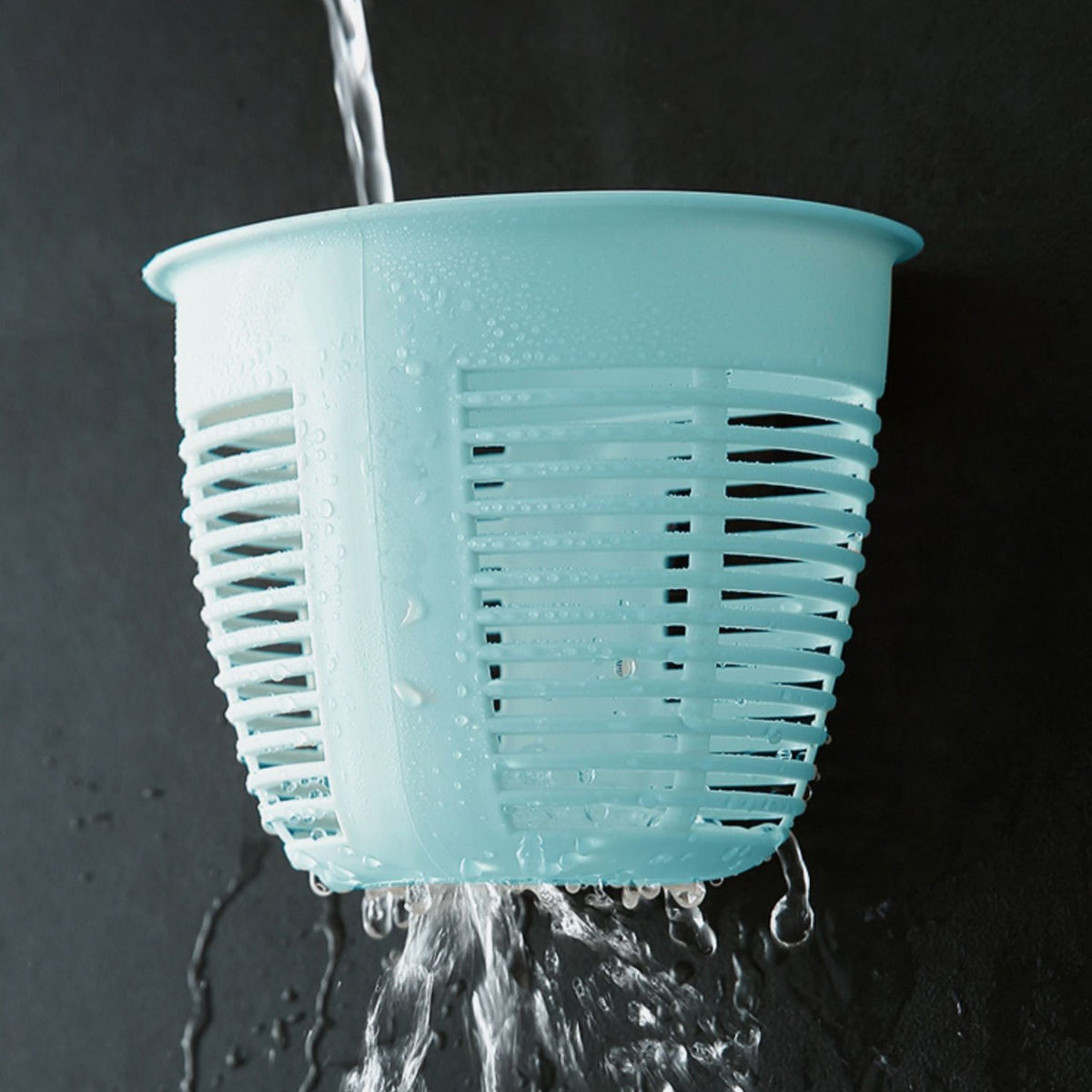 Collection of hanging plastic storage baskets in various colors, demonstrating versatility.
