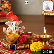Decorative Ganesha thali with kumkum and haldi bowls for festival puja