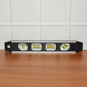 Precision aluminum spirit level with clear markings on bubble vials for alignment