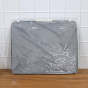 Close-up of the durable double zipper and reinforced handle on the foldable storage bag.