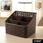 Brown woven design desk organizer basket holding office supplies