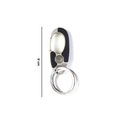 Close-up of locking clip mechanism on stainless steel keychain