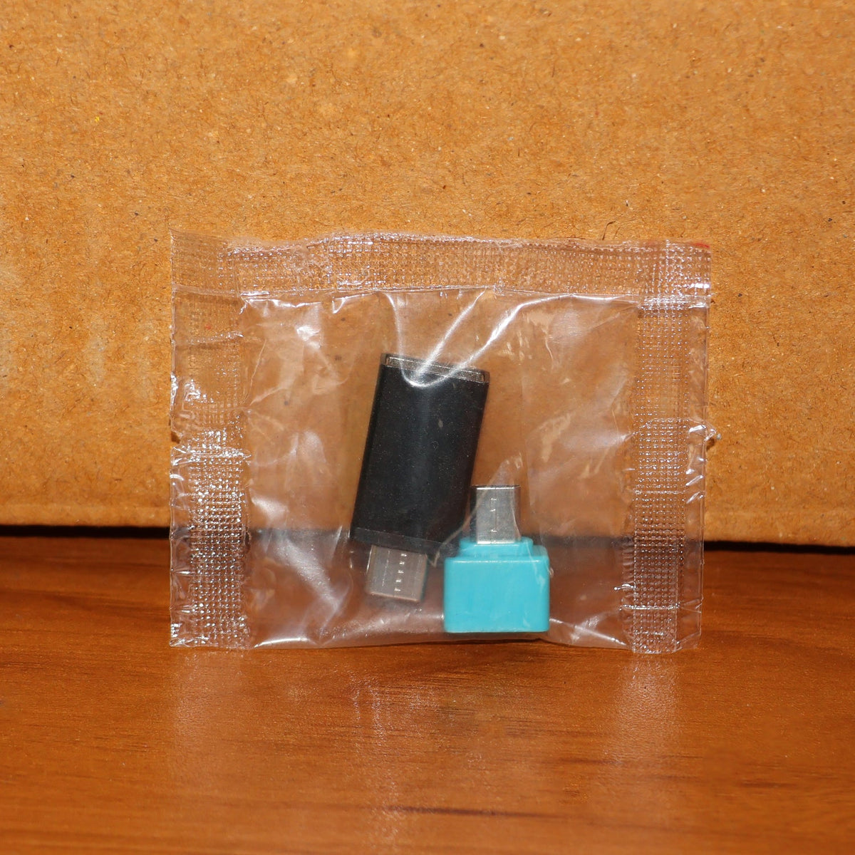 USB OTG adapter set with both Type-C and Micro USB adapters displayed in their packaging.