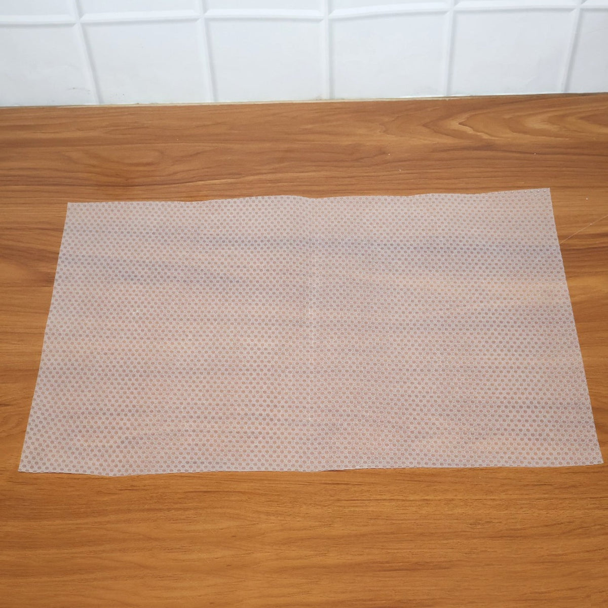 Close-up shot showing the textured surface of the refrigerator mat