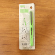 Pen-style compact scissors from FERVENT with the convenient clip attached. pen scissors