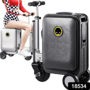 Person riding the Electric Scooter Suitcase through an airport terminal, showcasing effortless mobility.