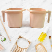 Top-down view of the square plastic bath mug, showcasing its wide opening.