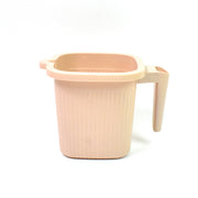 A clean white Plastic Bath Mug, perfect for a modern bathroom aesthetic.