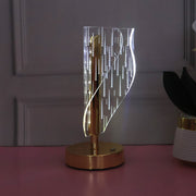 Close up of warm glowing crystal LED table lamp