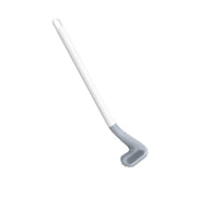 Set of colorful golf toilet brushes with their wall-mounted holders.