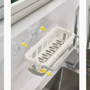 Clean and organized kitchen sink area, thanks to the efficient Bathora sink organizer.