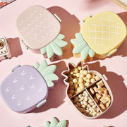 Closed pineapple shaped kids bento lunch box ready for school.