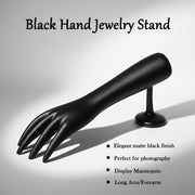 Palm side of black hand-shaped jewelry organizer stand
