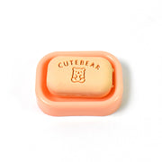 Assorted soap-shaped erasers packaged in a compact case