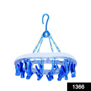 Top-down view of the multicolour 18-clip round plastic cloth drying hanger.