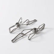Durable stainless steel clothes pegs holding clothes securely