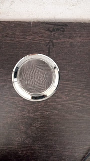 Top-down view of the effective drain stopper, preventing debris from entering the pipes.