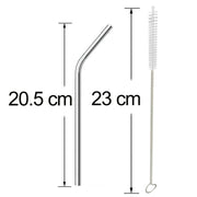 Four shiny bent metal straws and a cleaning brush laid out for inspection.