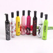Side view of the DrizzlePro Wine Bottle Umbrella, partially open.