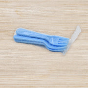 Five reusable plastic serving forks arranged elegantly, perfect for parties and events.
