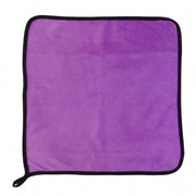 Multi-purpose purple microfiber cleaning cloth on surface