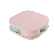 A multi-compartment Divided Snack Box in a dual-color woven design, filled with dry fruits.