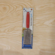 Packaged stainless steel handheld cheese grater