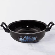 14 inch cast iron kadai showing rustic texture and wide base for Indian cooking