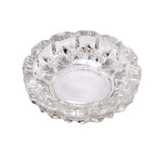 Versatile glass ashtray with multiple slots, suitable for both cigars and cigarettes.