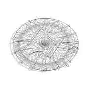 The durable stainless steel chef basket straining boiled vegetables for a healthy meal.