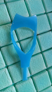 Full view of the 3-in-1 plastic Eyelash Tool, showcasing all its features.