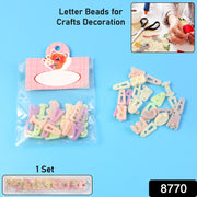 Close-up view of durable plastic alphabet letter beads for DIY projects.