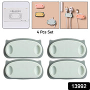 Close-up of pig-shaped cable holder clips organizing wires