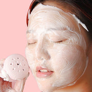 Soft bristles of the silicone facial cleansing brush providing gentle exfoliation.