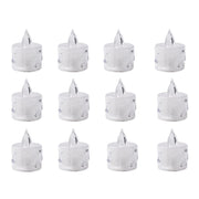 An array of decorative acrylic candles illuminating a festive display.