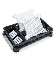 Compact dish drying rack with a removable water tray for easy cleaning.