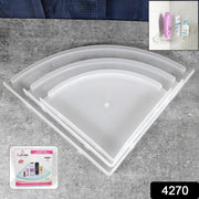 Wall-mounted plastic corner shelf holding shampoo and bath products.