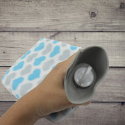 Front view of the hot water bag with its protective fabric cover.