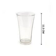 A hand holding one of the clear plastic juice glasses, demonstrating its ergonomics.