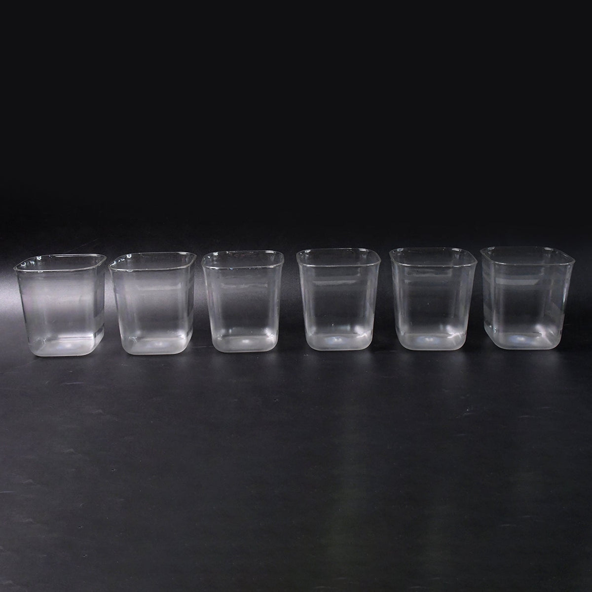 Side view of transparent diamond plastic glass set