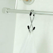 Set of 5 stainless steel S-hooks for home organization.